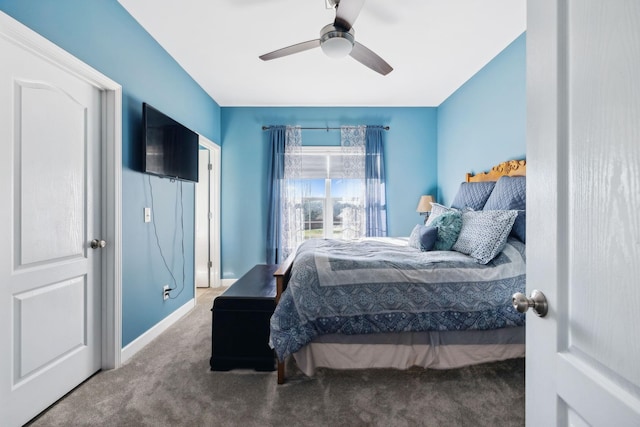 bedroom with ceiling fan and carpet floors