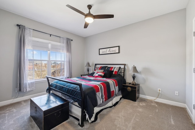 bedroom with ceiling fan and carpet