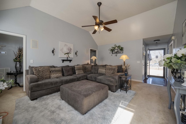 living room with ceiling fan, light colored carpet, and lofted ceiling