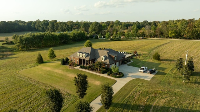 birds eye view of property with a rural view