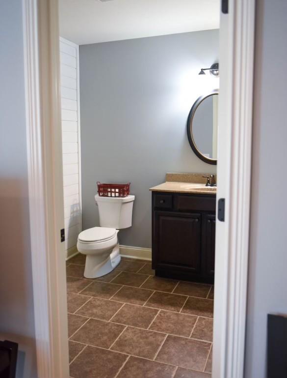 bathroom with vanity and toilet