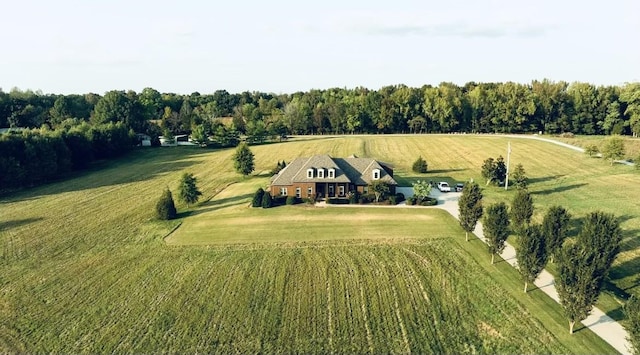 birds eye view of property with a rural view