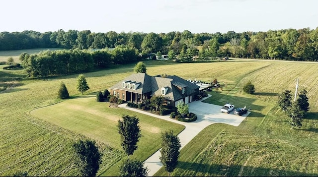 birds eye view of property with a rural view