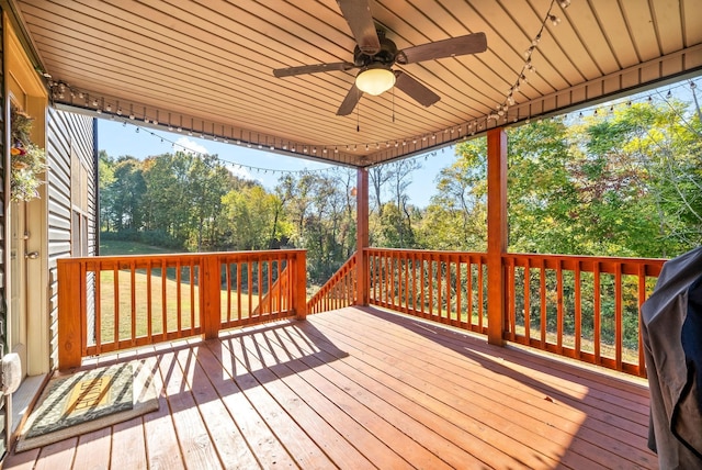 wooden deck with ceiling fan