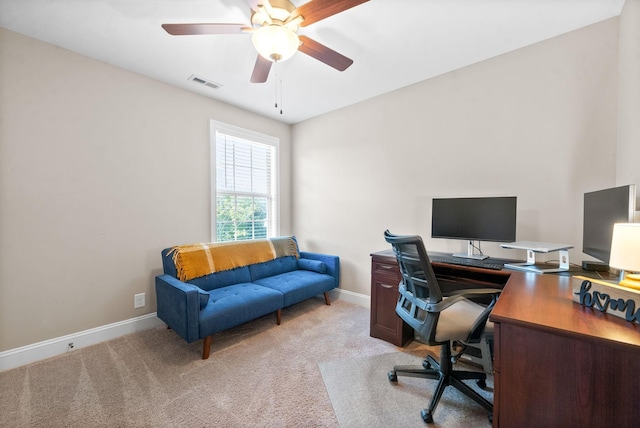 office featuring ceiling fan and light colored carpet