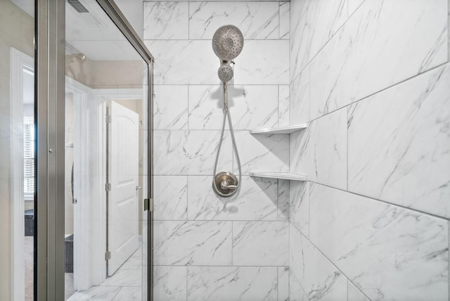 details featuring a tile shower