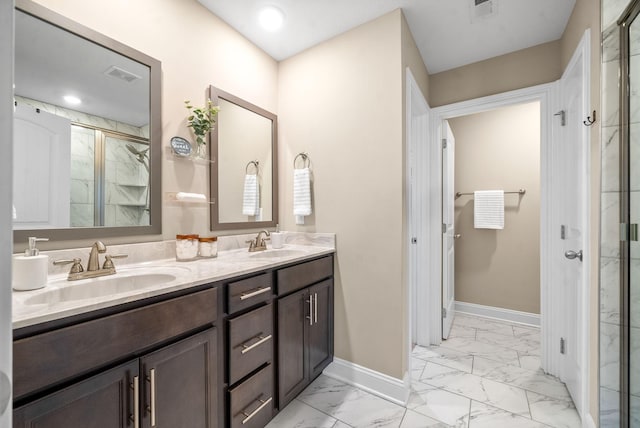 bathroom featuring vanity and an enclosed shower