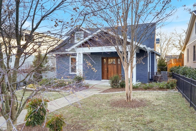 view of front of home with a front yard