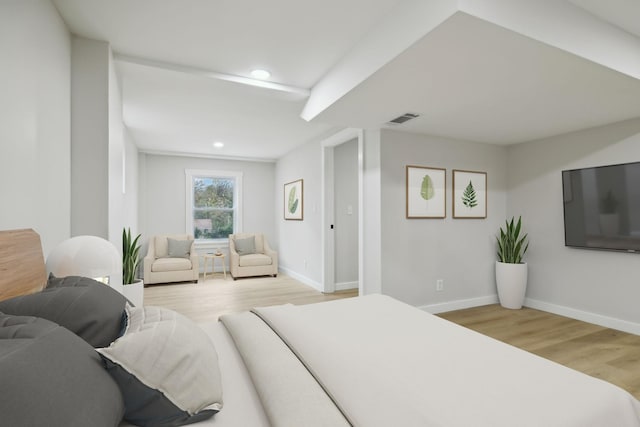 bedroom with light wood-type flooring