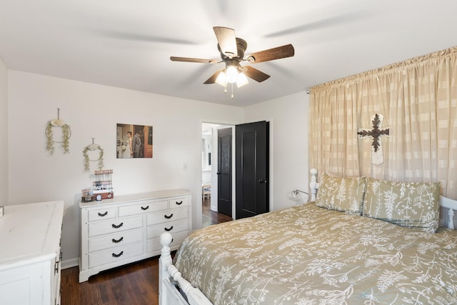 bedroom with ceiling fan and dark wood-type flooring