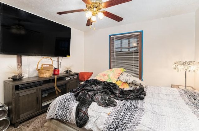 bedroom with carpet flooring and ceiling fan