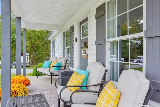 view of patio featuring a porch