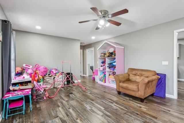 playroom featuring ceiling fan and wood-type flooring