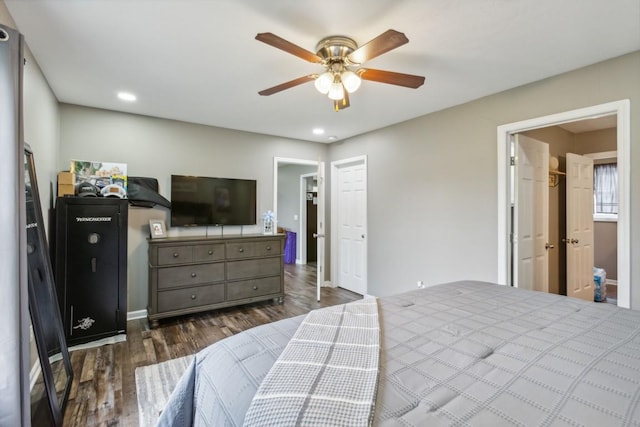 bedroom featuring ceiling fan and dark hardwood / wood-style flooring