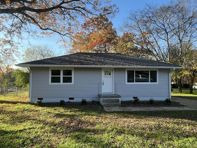 view of front of home featuring a front lawn