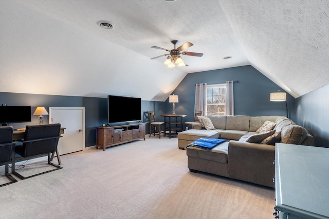 carpeted living room featuring lofted ceiling, a textured ceiling, and ceiling fan