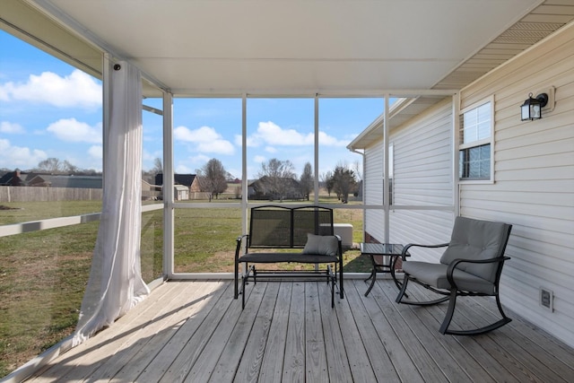 sunroom / solarium with a wealth of natural light