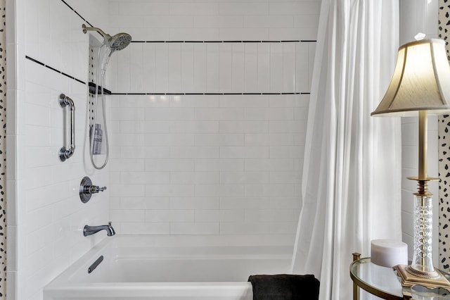 bathroom featuring shower / bathtub combination with curtain