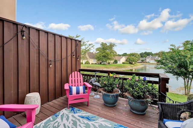 deck featuring a water view