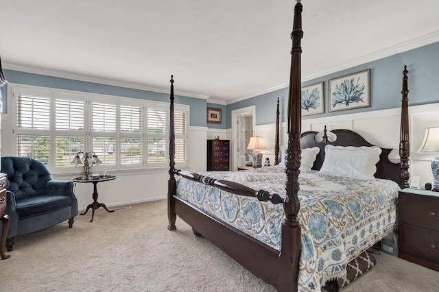 bedroom featuring light colored carpet and crown molding