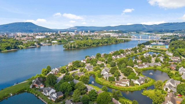 bird's eye view featuring a water and mountain view