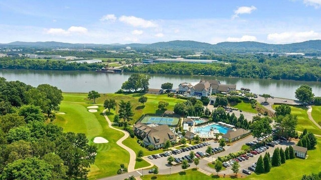 aerial view featuring a water and mountain view