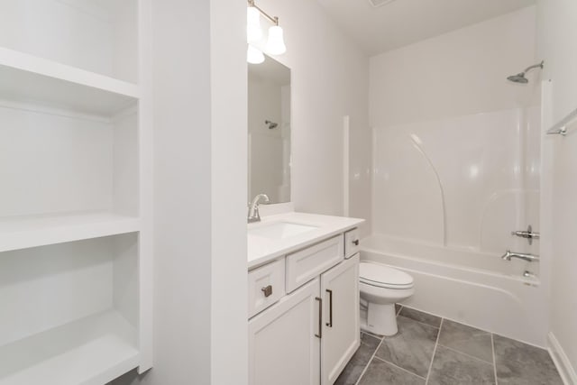 full bathroom featuring tile patterned floors, vanity,  shower combination, and toilet