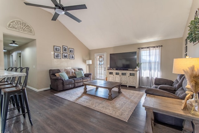 living room with dark hardwood / wood-style flooring, high vaulted ceiling, and ceiling fan