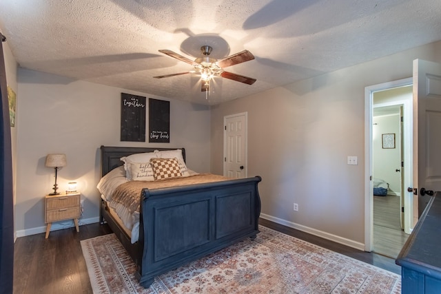 bedroom with a textured ceiling, ceiling fan, and dark wood-type flooring