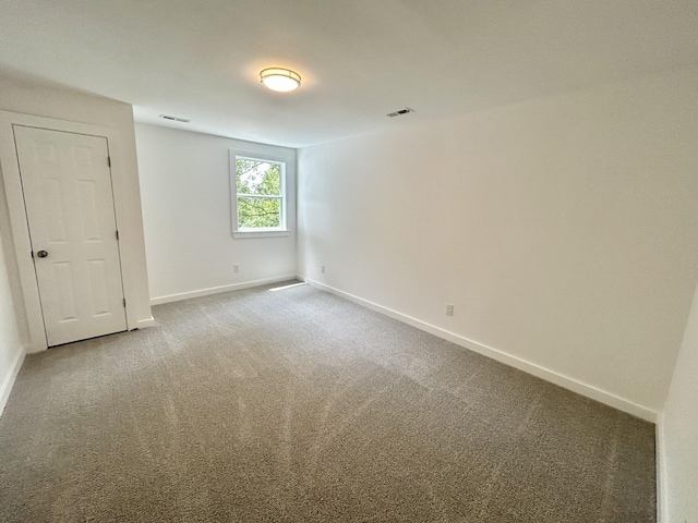 view of carpeted spare room