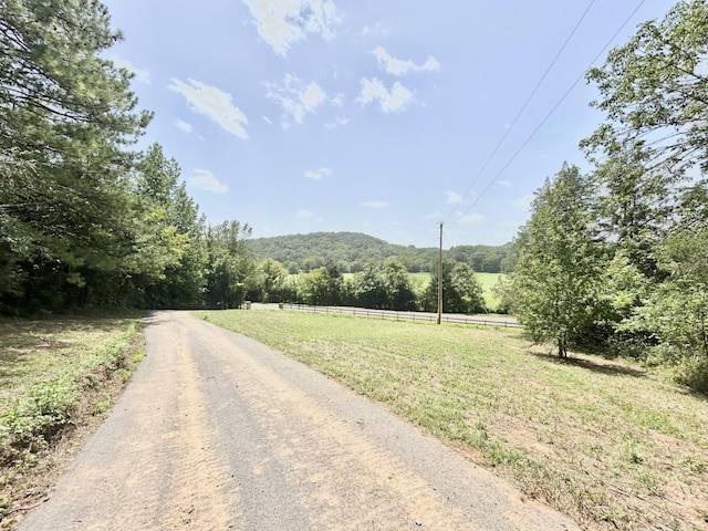 view of road with a rural view