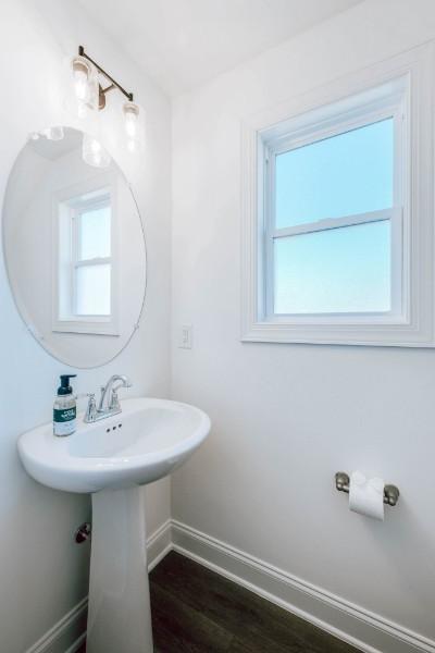 bathroom featuring wood-type flooring