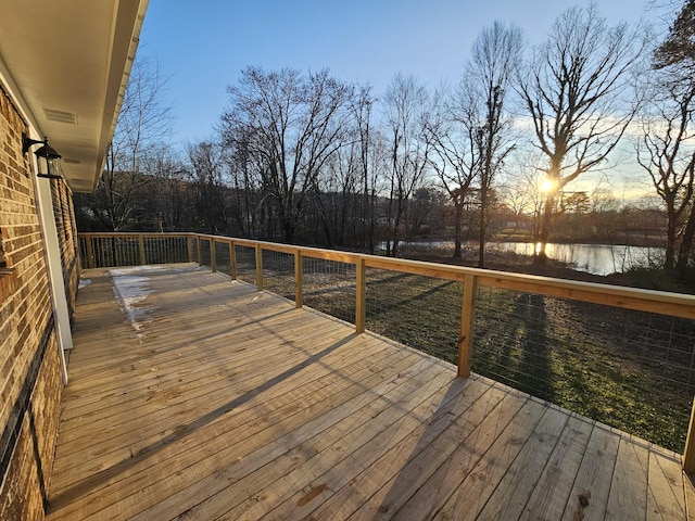 deck at dusk with a water view