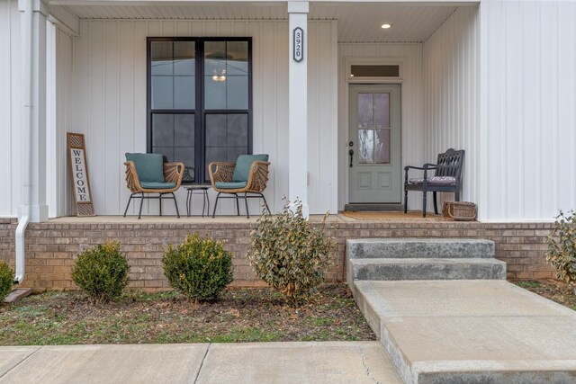 entrance to property with a porch