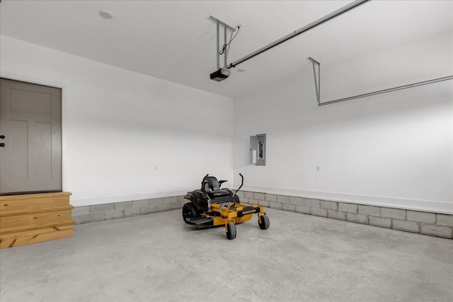 garage featuring electric panel and a garage door opener