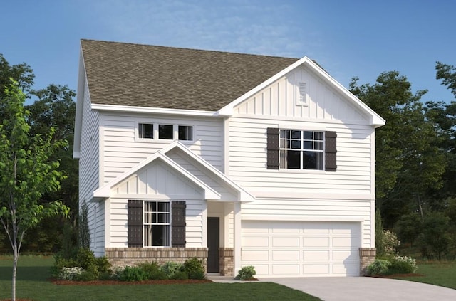 view of front facade with a garage and a front yard