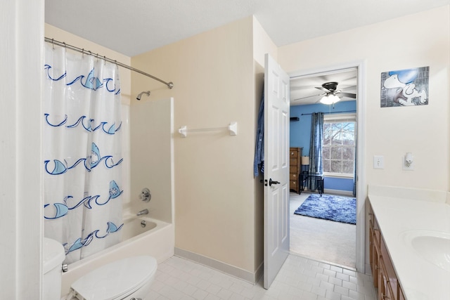 full bathroom with toilet, tile patterned flooring, shower / bath combo with shower curtain, ceiling fan, and vanity