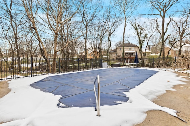 view of snow covered pool