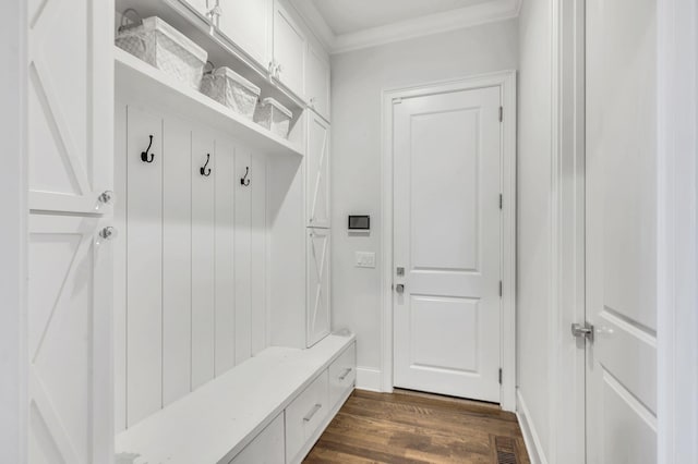 mudroom with dark hardwood / wood-style flooring and ornamental molding