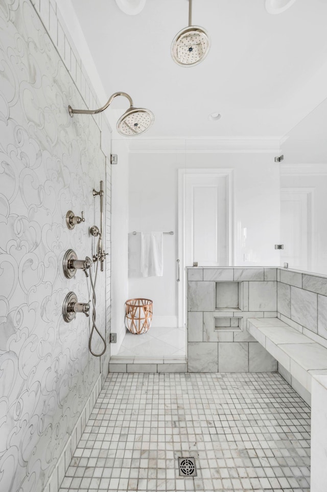 bathroom with tile patterned floors, ornamental molding, and tiled shower