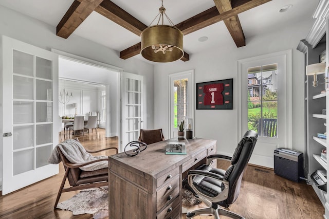 office space with beam ceiling, french doors, dark wood-type flooring, and coffered ceiling