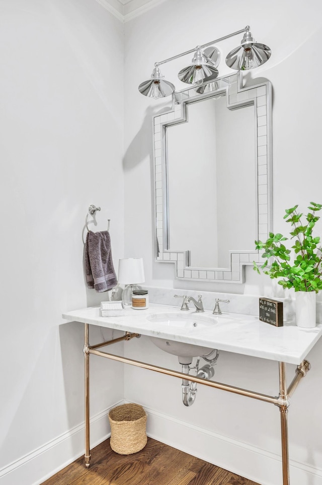 bathroom featuring hardwood / wood-style floors and sink