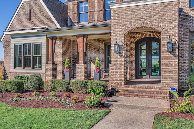 property entrance with french doors and covered porch