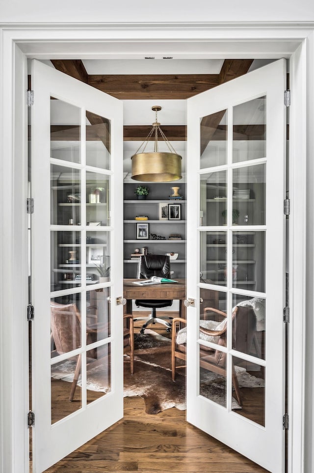 doorway to outside with wood-type flooring and french doors