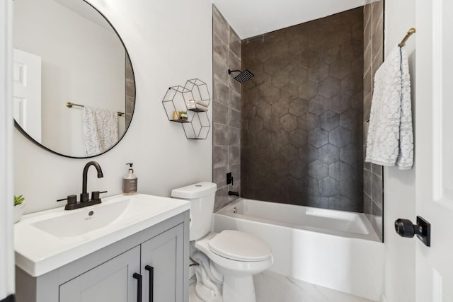 full bathroom with toilet, tiled shower / bath combo, and vanity