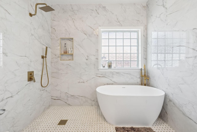 bathroom featuring separate shower and tub