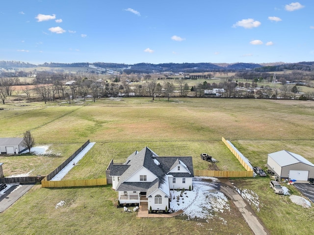 birds eye view of property featuring a rural view