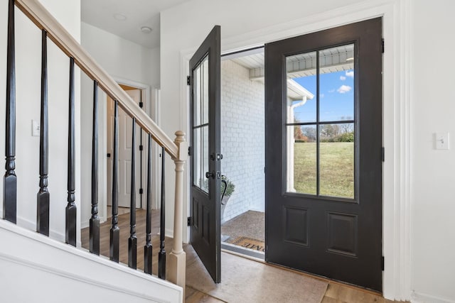 entrance foyer with light hardwood / wood-style floors