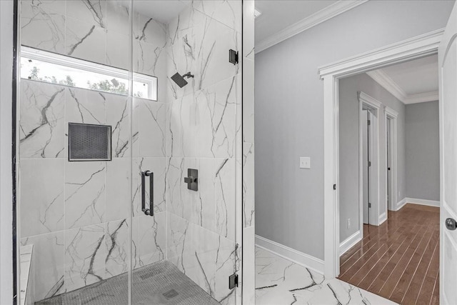 bathroom featuring walk in shower and crown molding