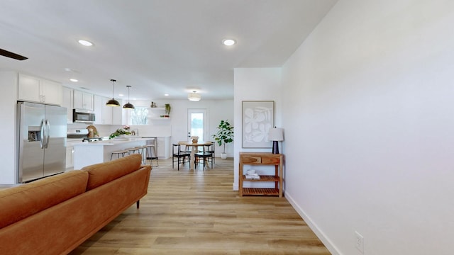 living room featuring light wood-type flooring